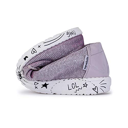 The Hey Dude Wendy Youth - Girls slip-on is a flexible, lightweight lavender shoe with a white sole, folded in half. Playful black doodles like stars, hearts, “LOL,” and more add a fun touch to this stylish design.