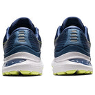 Rear view of ASICS Gel Kayano 28 - Mens stability running shoes featuring blue mesh uppers, white midsoles, neon yellow outsoles, and reflective silver heel accents for enhanced visibility.