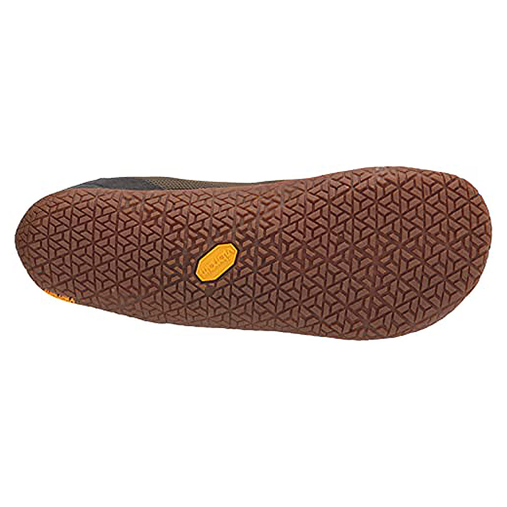 Close-up of the Vapor Glove 5 - Men by Merrell, showing its brown minimalist sole with a textured geometric tread and a small yellow Vibram logo near the center.
