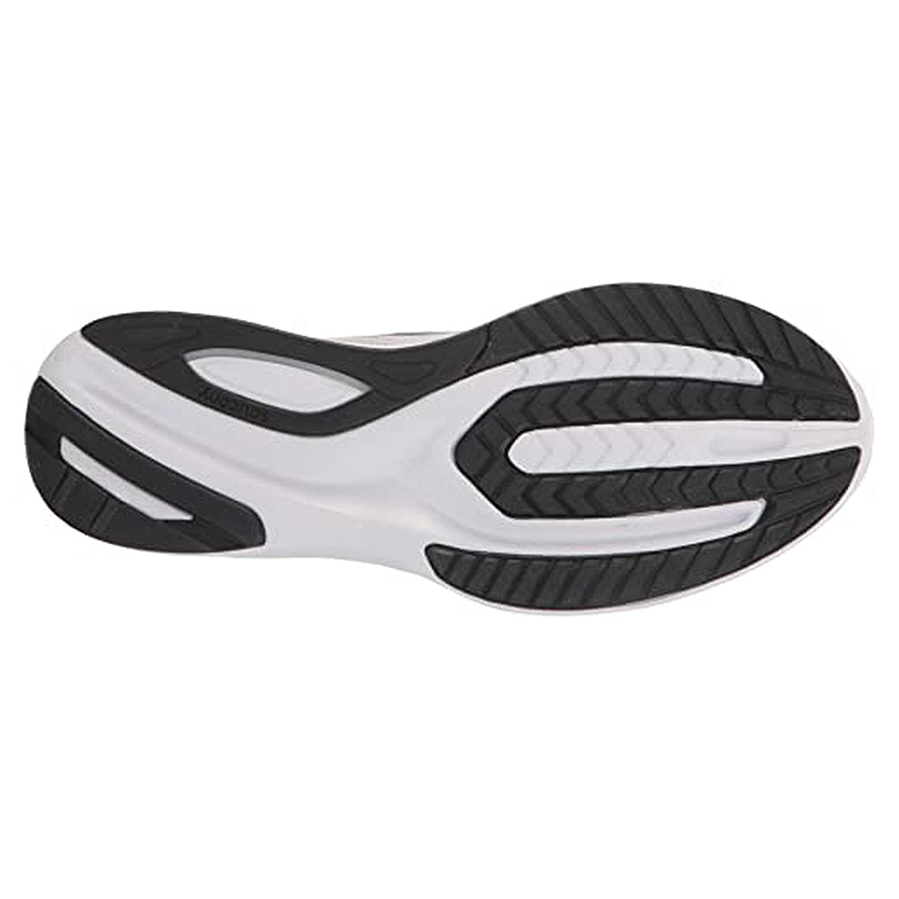 The image shows the Saucony Guide 16 Running Shoe - Mens sole, with a white base and black rubber patterns for traction, grooves for flexibility, and cushioning for comfortable runs.