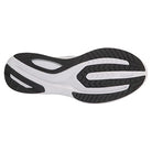 The image shows the Saucony Guide 16 Running Shoe - Mens sole, with a white base and black rubber patterns for traction, grooves for flexibility, and cushioning for comfortable runs.