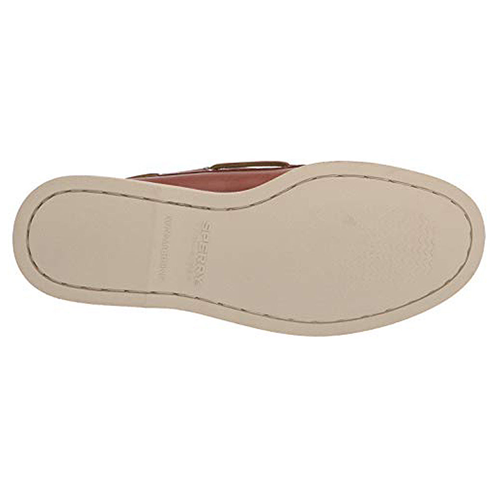 The image shows the bottom view of a Sperry A/O 2-EYE LEATHER - Mens boat shoe with a light rubber sole, visible edge stitching, and the word SPERRY embossed in the center.