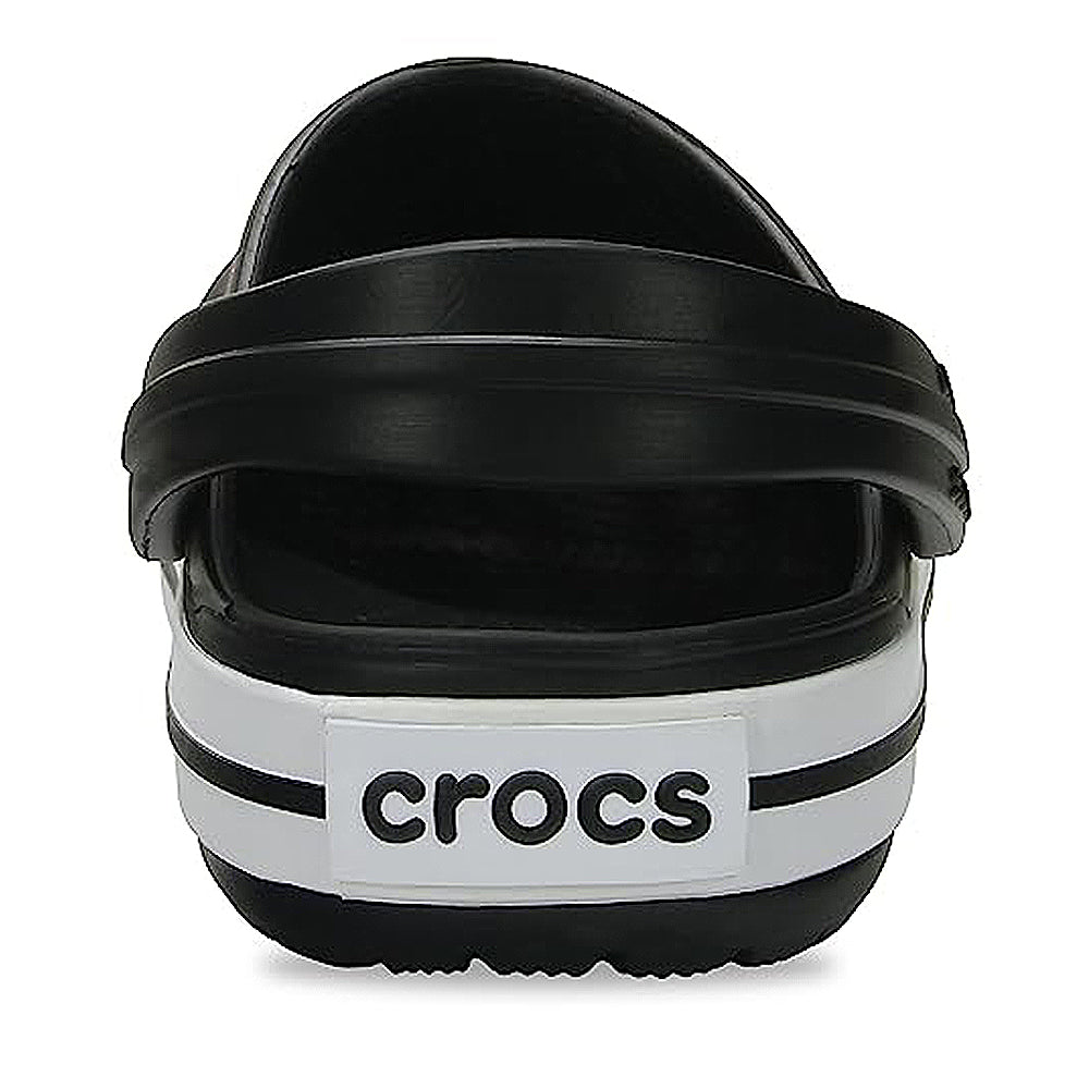 The Crocs CrocBand Clog - Unisex is shown from the back in black and white, featuring a white heel strap with bold black Crocs branding and signature Crocs Comfort for lightweight cushioning.