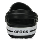 The Crocs CrocBand Clog - Unisex is shown from the back in black and white, featuring a white heel strap with bold black Crocs branding and signature Crocs Comfort for lightweight cushioning.