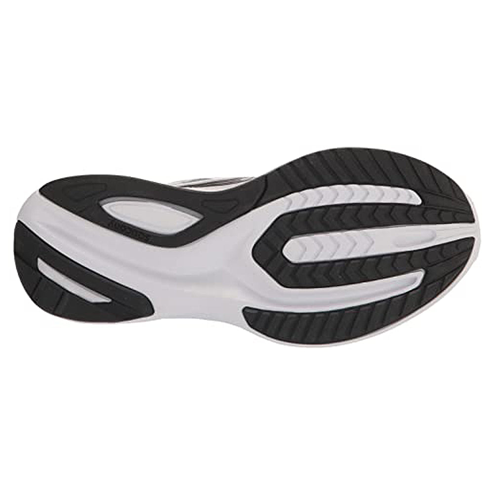 A close-up of the Saucony Guide 16 - Womens shows the black and white patterned rubber sole with grooves for traction and PWRRUN foam for cushioned support.