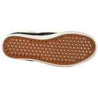 The image shows the sole of the Vans ComfyCush Old Skool - Unisex shoe, featuring a gum rubber waffle pattern and a white outer edge typical of classic skate shoes.