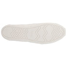 A white sole with zigzag and diamond tread patterns, inspired by the Alpargata—Womens, features the TOMS brand name at its center.