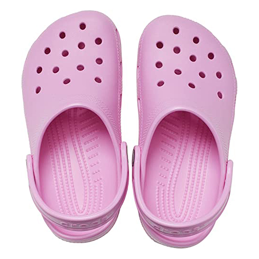 The Crocs Classic Clog - Kids in light pink features ventilation holes and adjustable heel straps, shown from above—ideal everyday shoes for kids that offer comfort and classic style.