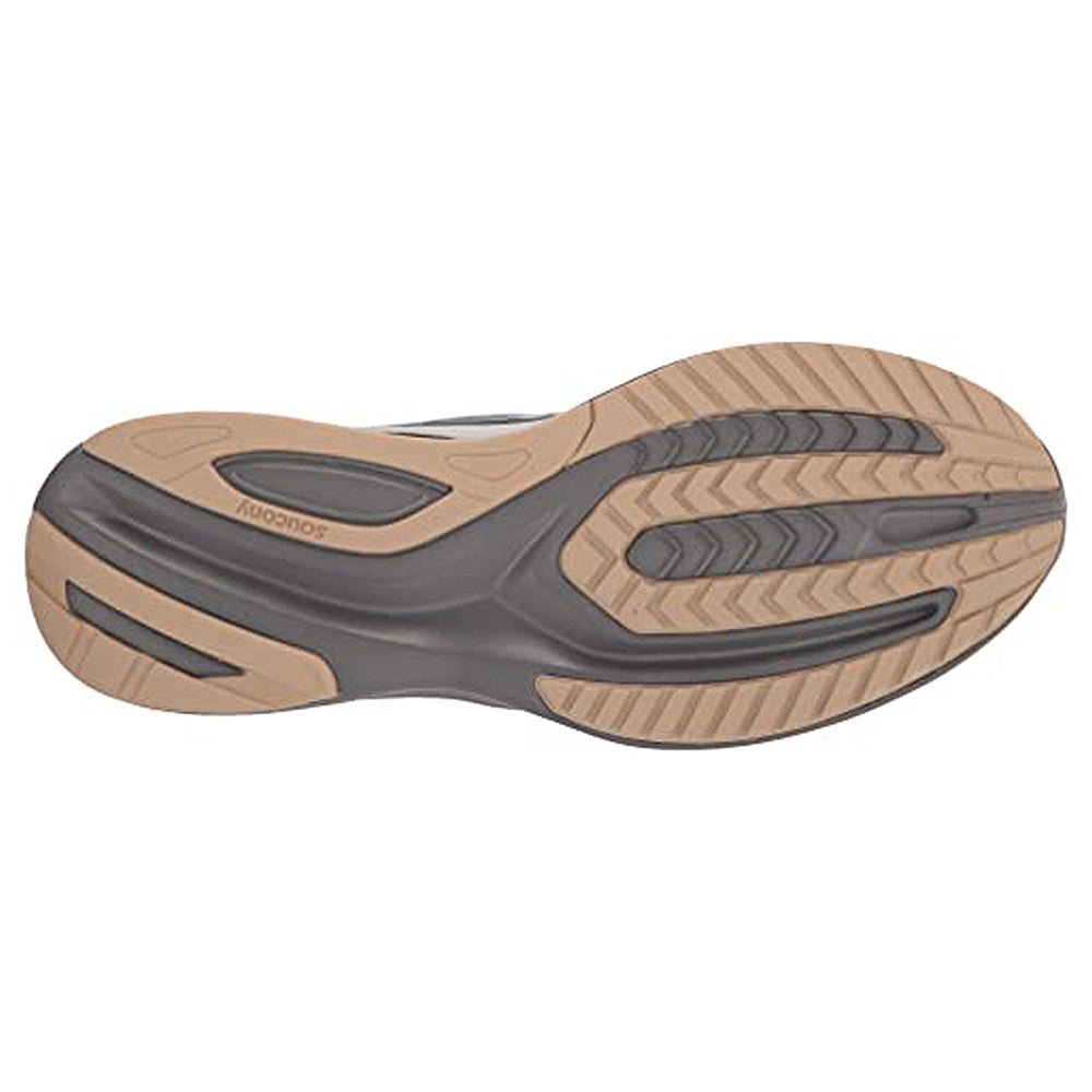The image displays the sole of the Saucony Guide 16 Running Shoe - Mens, featuring tan and dark gray sections with textured grip grooves. The Saucony logo appears near the heel, emphasizing this shoe’s comfort and support.