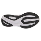 The image shows the black and white sole of the Saucony Guide 16 Running Shoe - Womens, featuring a textured tread pattern for traction and cushioned support.