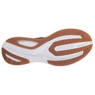The image displays the Saucony Guide 15 - Men running shoe sole, highlighting its white cushioned midsole and brown and white rubber grip sections with grooved patterns for traction and lightweight support.