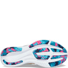 The Saucony Ride 15 - Womens running shoe features a white upper, PWRRUN cushioning, and a sole with vibrant blue, teal, and pink camo-style patterns plus grooves for traction.