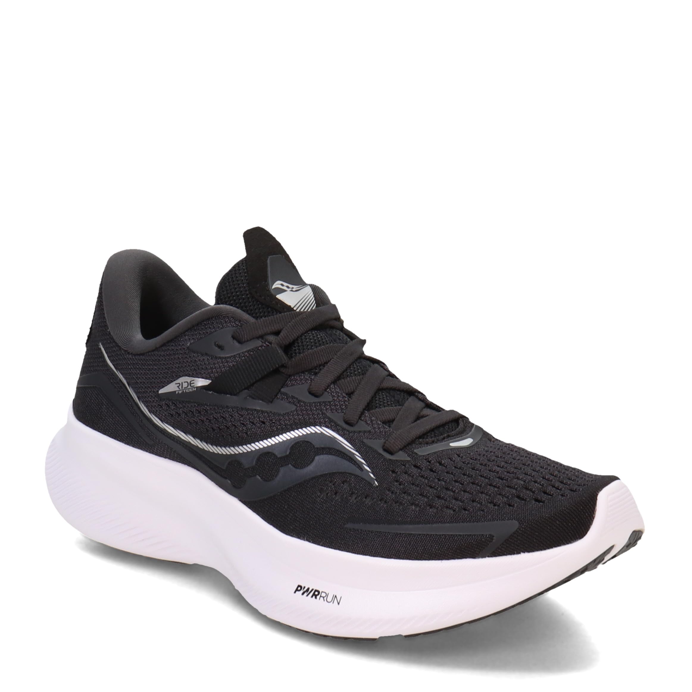 The Saucony Ride 15 - Womens running shoe features a black mesh upper, black laces, silver wave side design, and white sole with PWRRUN-cushioned midsole. The shoe is positioned to display its side and front.