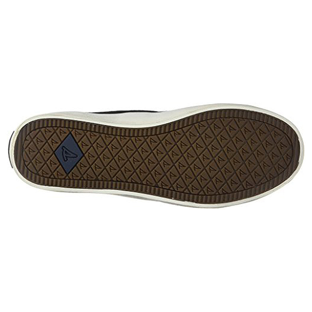 The image shows the sole of the Sperry Crest Vibe - Womens sneaker, featuring a brown diamond-patterned tread, a small blue triangle logo near the heel, and a white edge.