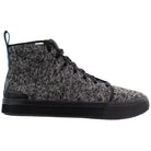 The TOMS Alpargata ESP - Women is a black and gray high-top sneaker with a textured knit upper, black laces, and a black rubber sole—embodying TOMS’ signature commitment to giving back.