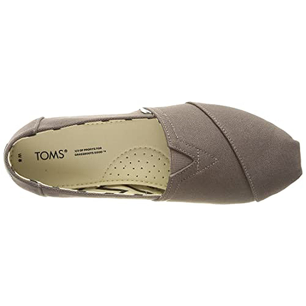 Top view of a single TOMS Alpargata - Womens slip-on in taupe, featuring a round toe, slightly pointed front, perforated comfort insole, recycled cotton upper, and TOMS branding on the heel.