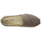 Top view of a single TOMS Alpargata - Womens slip-on in taupe, featuring a round toe, slightly pointed front, perforated comfort insole, recycled cotton upper, and TOMS branding on the heel.