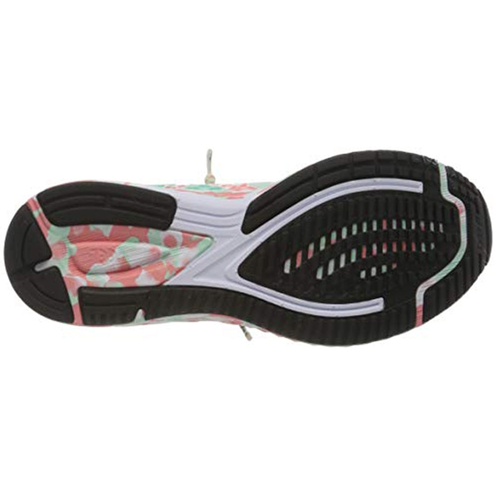 The image displays the sole of an ASICS GEL-NOOSA TRI 12 – Womens running shoe, featuring a pink and green patterned upper, a black and white rubber sole with traction grooves, and FLYTEFOAM midsole technology.