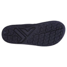 The black sole of the Telic Footwear Energy Flip Flop - Unisex features a geometric tread with lines for grip, a bold central arrow-like design, and raised text, providing both style and function when viewed from below.