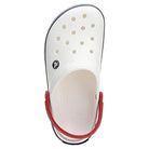 The Crocs Crocband Clog Seasonal Colors - Unisex features a white slip-on design with circular vents, a red heel strap, and the Crocs logo—now available for purchase.