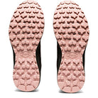 The image displays the soles of ASICS Trail Scout - Womens trail running shoes, featuring pink, textured treads with a patterned design and the ASICS logo at the center—ideal for trail running enthusiasts.