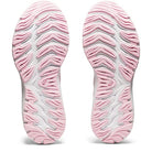 The image shows the soles of a pair of ASICS Cumulus 23 - Womens shoes with wavy, light pink and white tread patterns, viewed from the bottom. The ASICS logo appears near the center, emphasizing their lightweight cushioning.