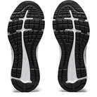The image shows the black rubber outsoles of the ASICS GEL-EXCITE 7 - Womens, featuring white grooves and textured tread for traction and flexibility. This lightweight running shoe also has a cushioned midsole for comfort.