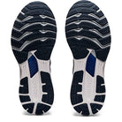 The image shows the outsoles of ASICS Gel Kayano 28 - Mens shoes, with a black textured pattern, white and blue accents, and features like grooves, ridges, and GEL technology for traction, flexibility, and support.