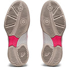 The ASICS Gel-Game 8 - Kids’ athletic shoes are shown from the sole, featuring beige outsoles with detailed tread patterns and a bold pink midfoot accent that highlights TRUSSTIC technology for added stability.