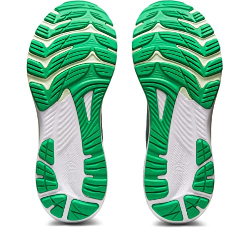 A pair of ASICS Gel Kayano 29 – Mens running shoe soles in green and white, with unique tread designs for stability, displayed side by side with toes facing upward.