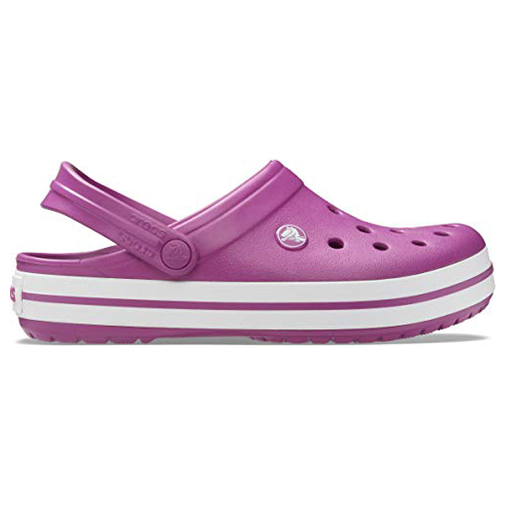 The Crocs Crocband Clog Seasonal Colors - Unisex is shown in purple with a white and purple striped sole, heel strap, and ventilation holes on top and sides. Displayed from the side on a white background.