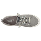 Top view of a gray Sperry Crest Vibe - Womens canvas sneaker with a white rubber sole, light gray laces, and heel pull tab. This durable shoe offers arch support, and the SPERRY logo is visible on the insole.