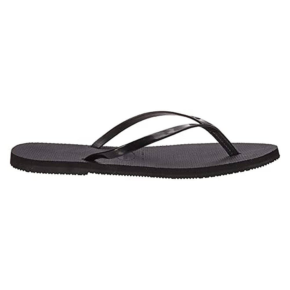 The Havaianas Slim Metalic - Womens flip-flop features a black textured sole and thin, glossy straps, displayed in a side view against a plain white background.