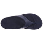 The Telic Footwear Energy Flip Flop - Unisex in navy blue features a textured footbed, wide strap, pillow-soft cushioning, and excellent arch support for all-day comfort when viewed from above.
