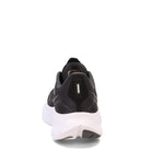 Rear view of the Saucony Ride 15 - Womens: a black lightweight running shoe with a white sole, mesh upper, and small reflective heel strip, displayed against a plain white background.