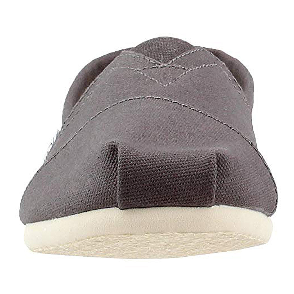 Front view of the TOMS Alpargata ESP - Women slip-on canvas shoe in gray, featuring a rounded toe and light rubber sole, displayed on a plain white background.