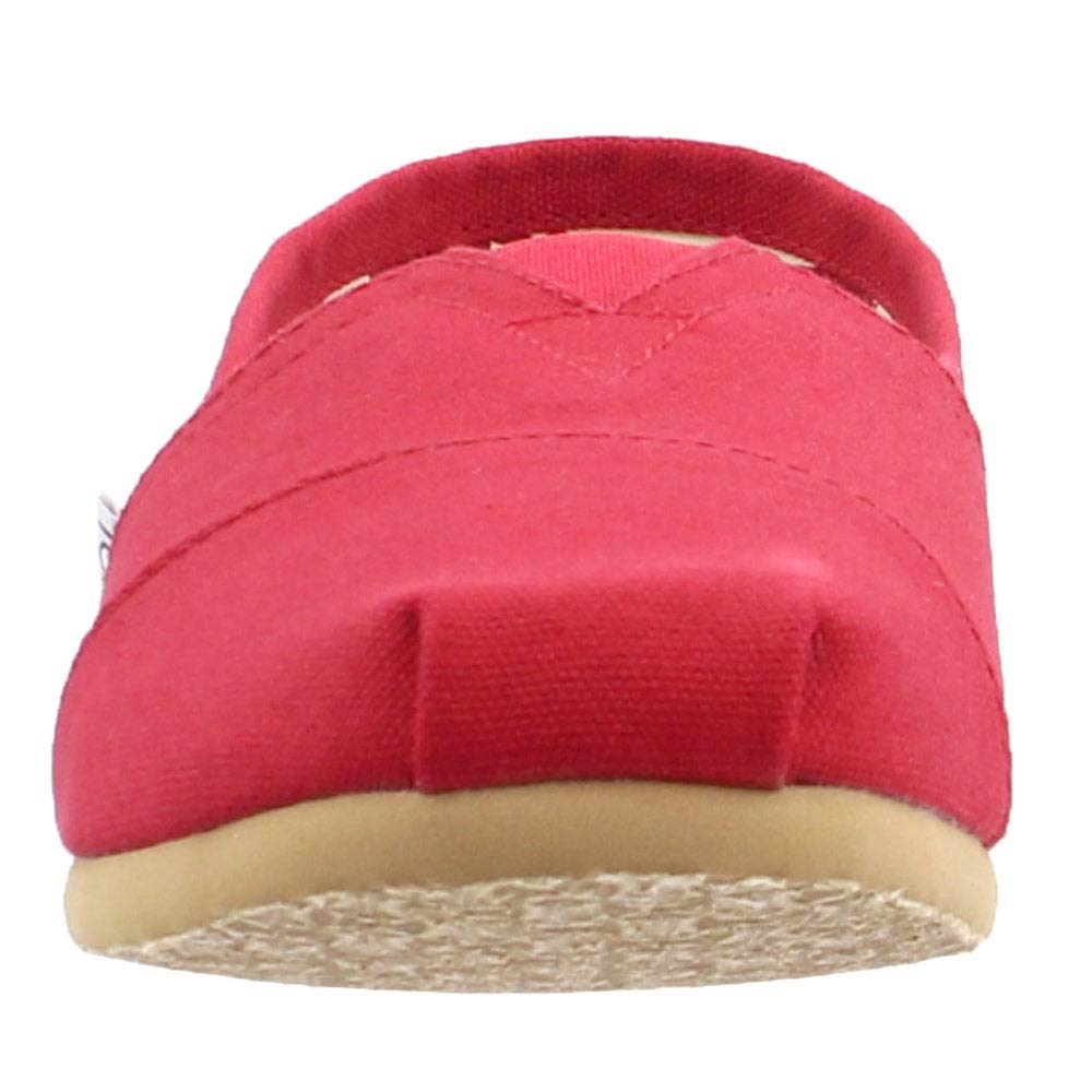 Front view of the TOMS Classic Canvas - Men slip-on in red, featuring a beige rubber sole and visible stitching, inspired by the iconic TOMS design.