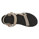 The Teva Midform Universal - Womens sandal, shown from above, features a black textured sole and beige adjustable straps encircling the ankle and toes in a versatile water-ready design.