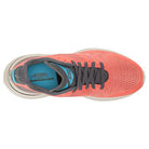 Top view of Saucony Guide 16 Running Shoe - Womens in coral with a white sole, gray laces, and blue insole. This lightweight shoe features breathable mesh and cushioned support for comfort.