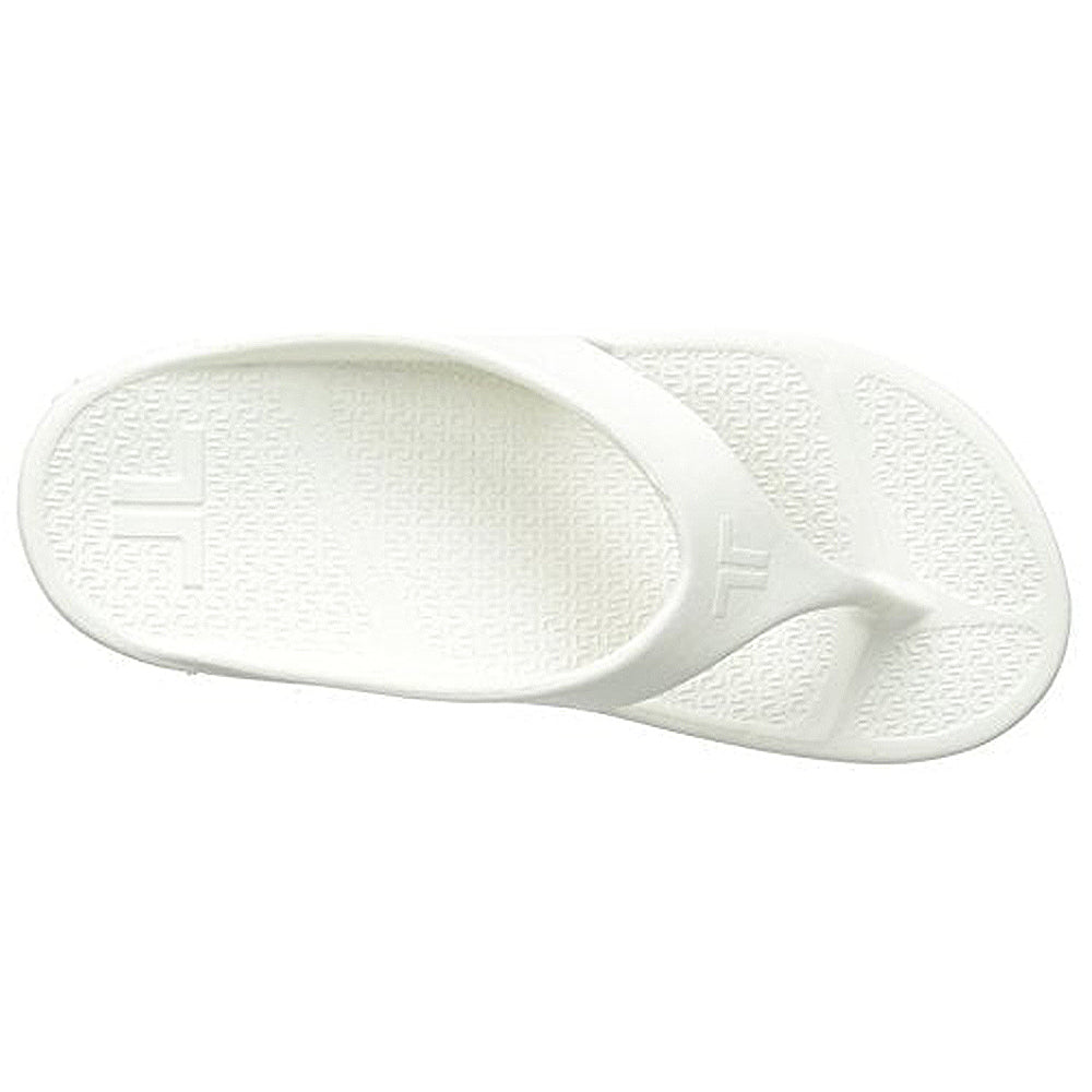 The Telic Footwear Energy Flip Flop - Unisex in white features a Y-shaped thong strap, textured footbed, and pillow-soft cushioning for exceptional comfort, shown from above on a plain background.