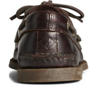 A close-up rear view of the Sperry A/O 2-EYE LEATHER mens boat shoe highlights visible stitching, lace detail, brass side eyelets, a logo embossed on the heel tab, and a durable rubber sole.