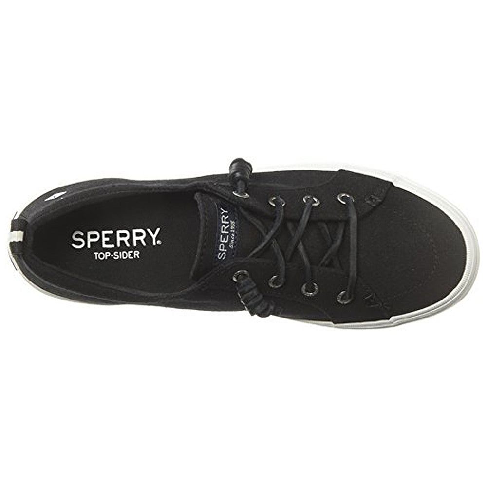 Top view of the Sperry Crest Vibe - Womens sneaker in black, featuring black laces, white stitching, and a white rubber sole. The Sperry logo appears on the insole and tongue. Designed for comfort with reliable arch support.