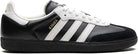 The adidas Samba OG - Men features a black and white leather upper with signature white stripes, a black sole, and gold SAMBA text on the side—ideal for classic street style.
