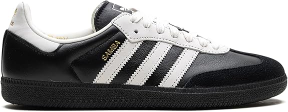 The adidas Samba OG - Men features a black and white leather upper with signature white stripes, a black sole, and gold SAMBA text on the side—ideal for classic street style.