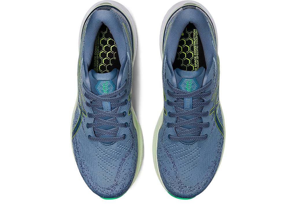 Top view of ASICS Gel Kayano 29 - Mens running shoes in blue with green accents. Featuring laces and hexagonal black and green insoles, these stability shoes are placed side by side on a white background.