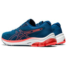 A pair of blue ASICS GEL-PULSE 12 - Womens running shoes with red accents and white soles, featuring an engineered mesh upper, cushioned heels, and AmpliFoam midsole. The ASICS logo is displayed on the side.