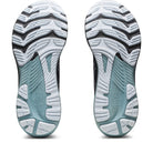 The image shows the clean, unworn outsoles of ASICS Gel Kayano 29 - Mens running shoes, featuring a white, black, and light blue pattern for grip, stability, and support.