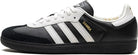 The adidas Samba OG - Men features a black and white leather upper, three white stripes, white laces, and gold SAMBA lettering on the side—an iconic sneaker for timeless street style.