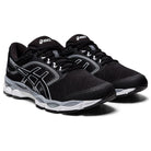 A pair of ASICS Gel-Ziruss 3 mens running shoes in black with white soles and silver accents, shown from the front left angle.