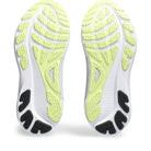The image displays the soles of ASICS Gel-Kayano 30 - Mens shoes, featuring light green and black rubber treads on a white base for enhanced grip and flexibility. The shoes are side by side with toes pointing upward.